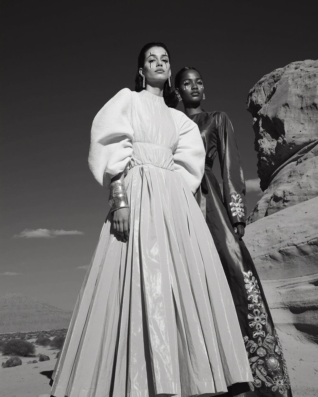 Two models in white couture, black and white, Daughter of the Wind