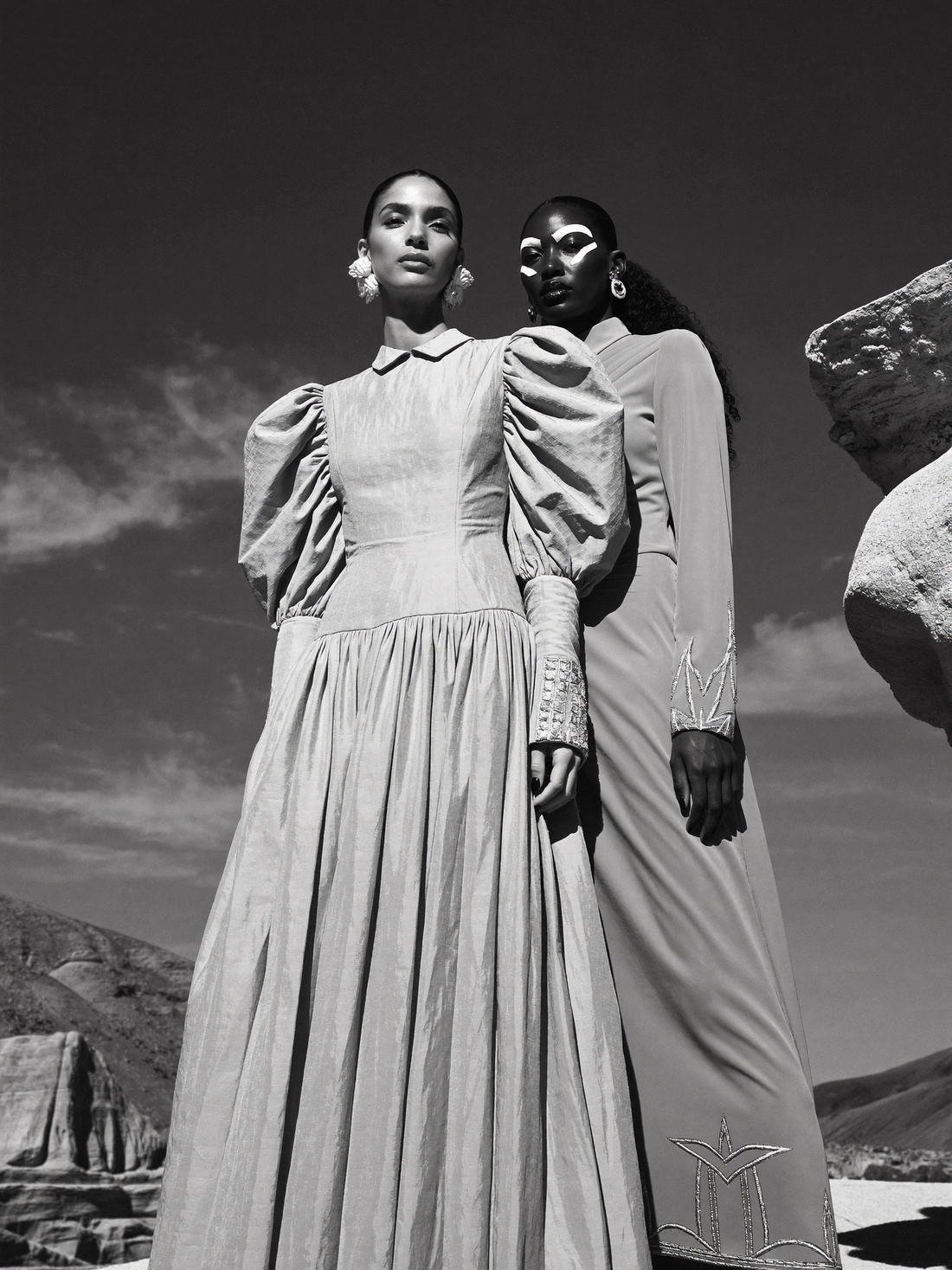 Black and white portrait of two models in couture, Daughter of the Wind