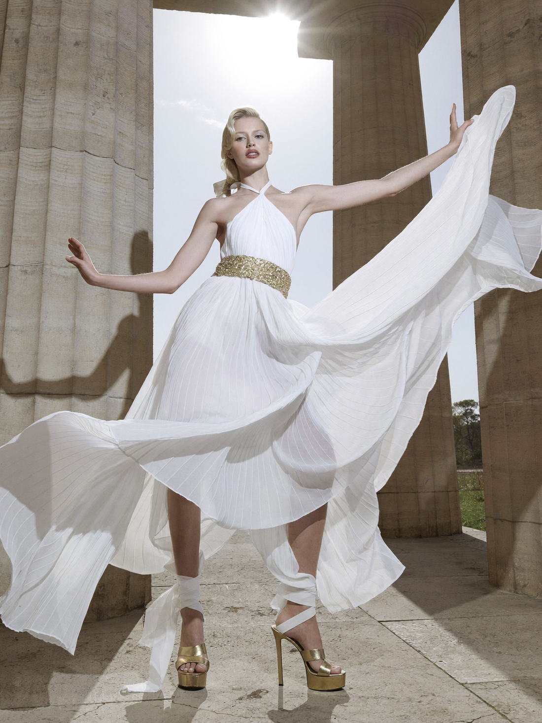 Chiffon train caught mid-movement among columns, Fragments of a Forgotten Queen