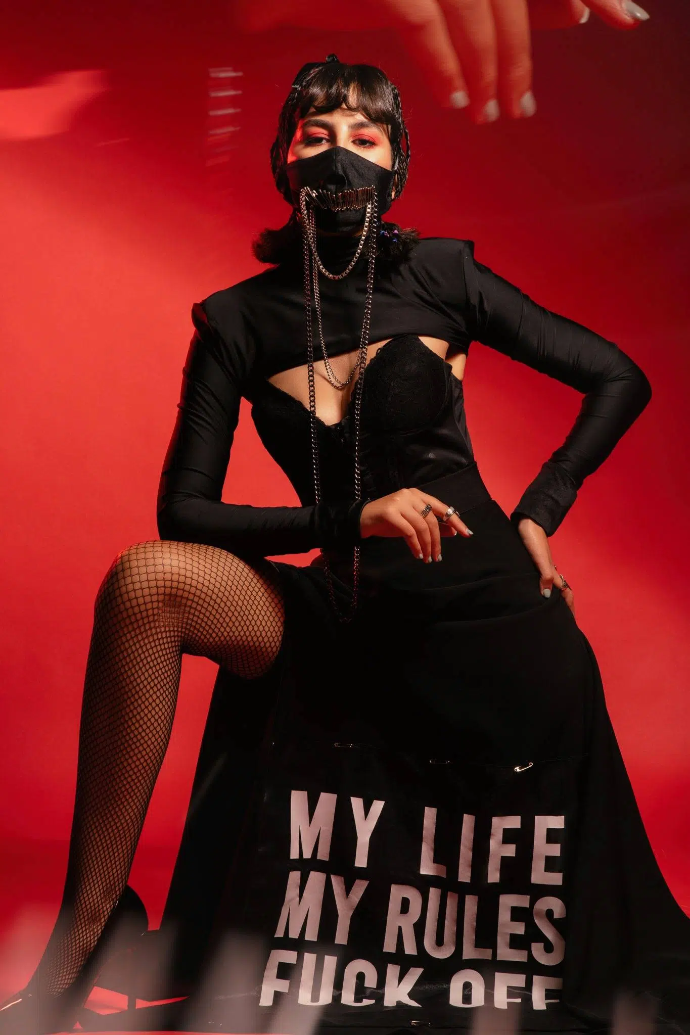 Studio fashion photography capturing the intricate details of haute couture.