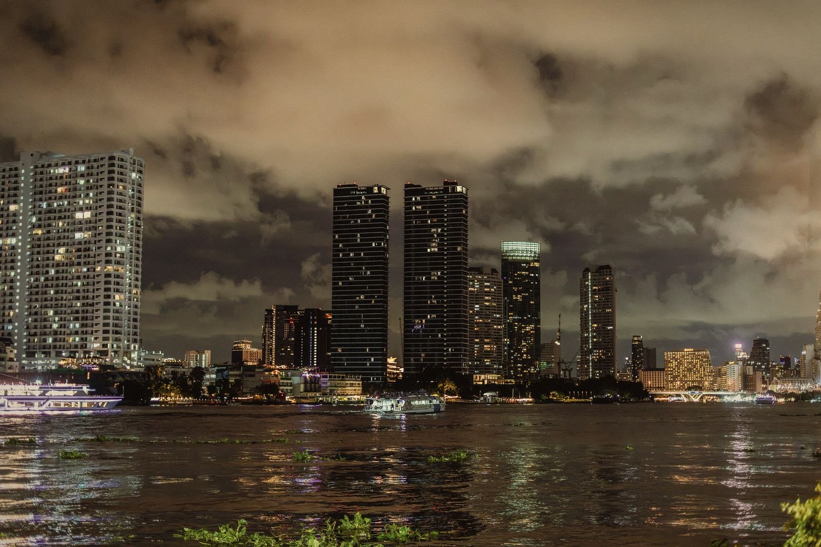 The Bangkok skyline over the Chao Phraya river at night