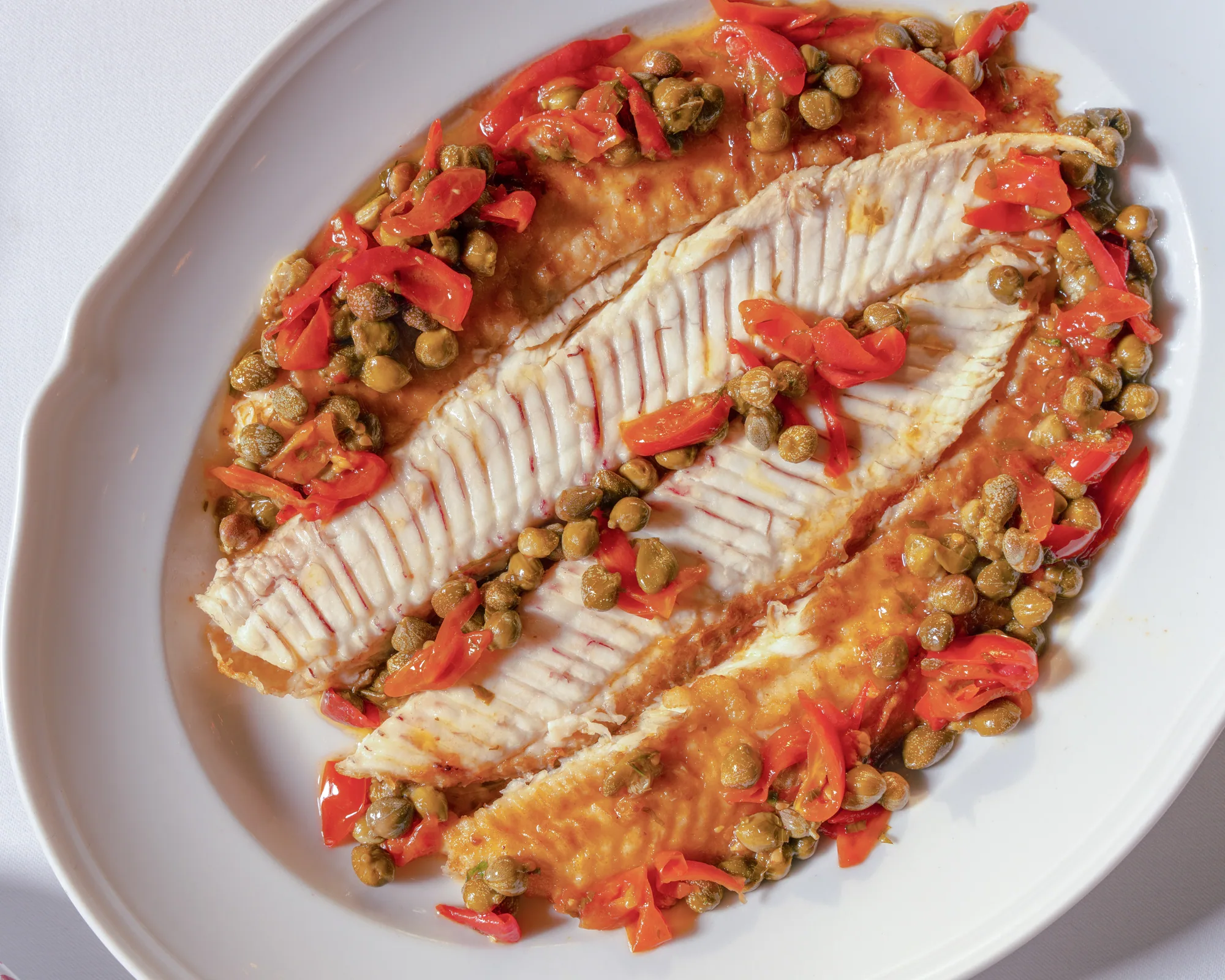 Whole sole with capers and tomato at Carbone Doha