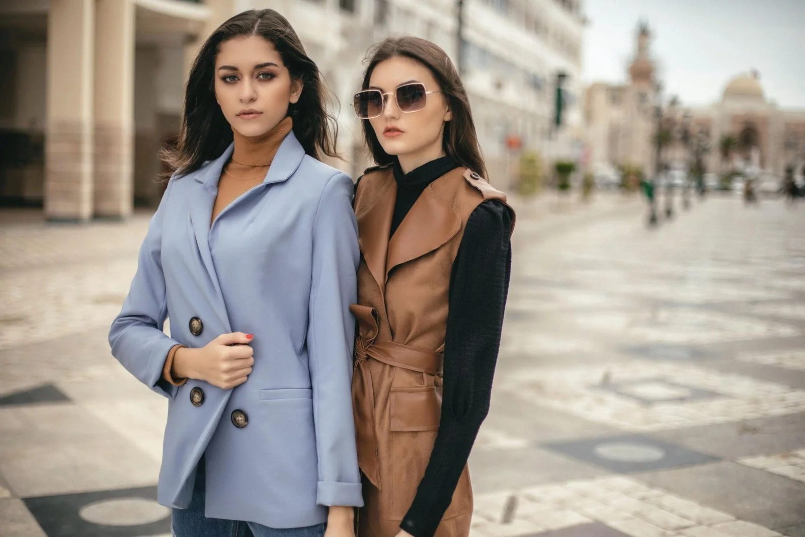 Fashion Photography Doha 2 Two models in tailored coats on a city street, fashion photography in Doha by Ghassen Oueslati