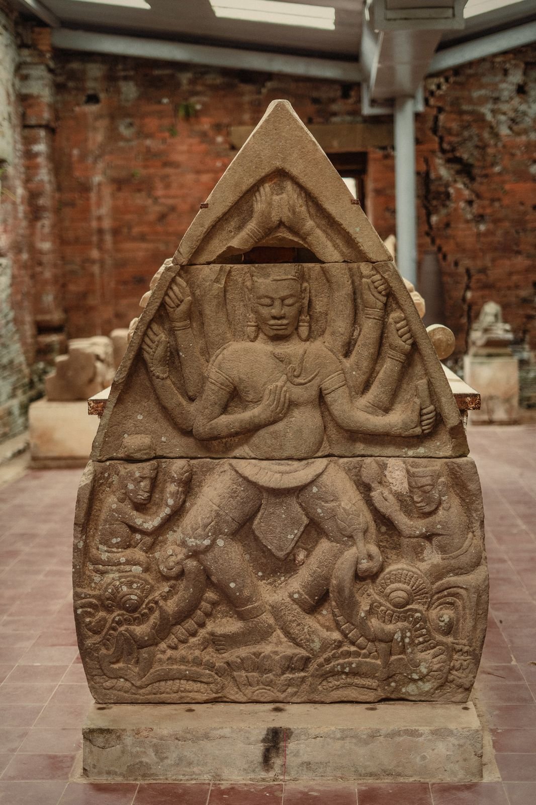 A sandstone pediment carved with a dancing figure at My Son