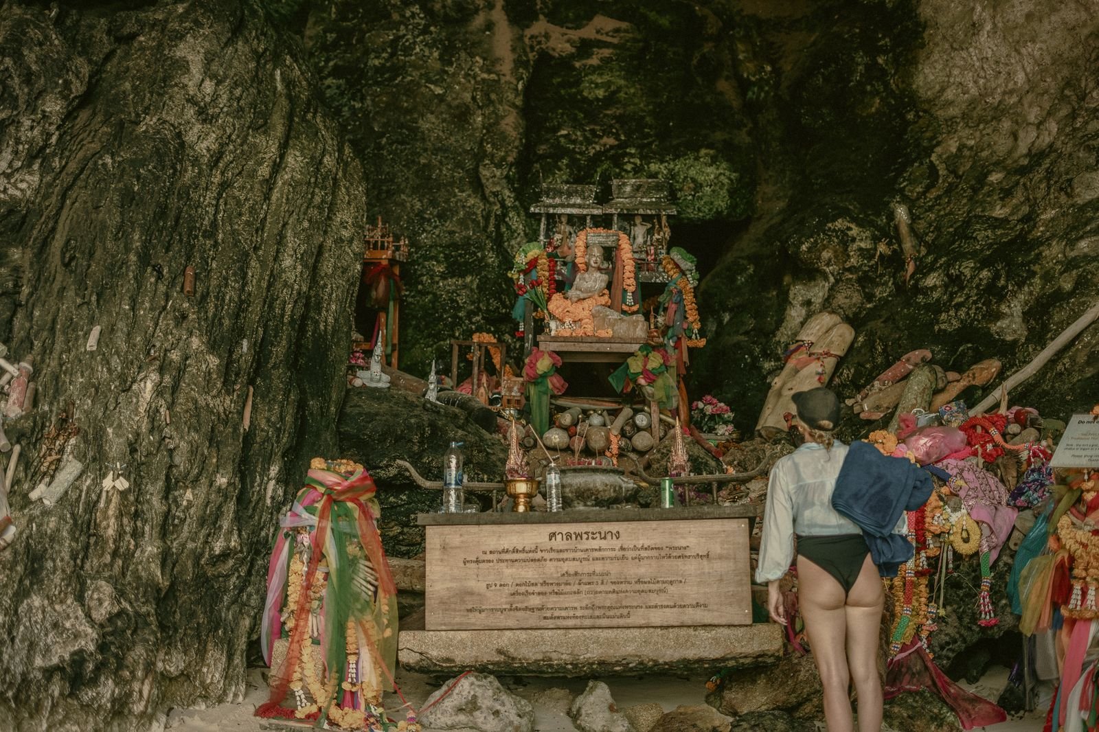 Offerings left at the Phra Nang cave shrine, sacred to local fishermen