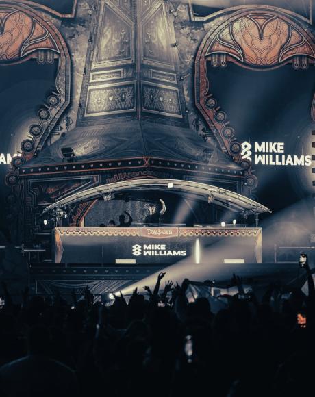 Elegant interior event photography capturing the ambiance and architectural details of a high-end event in Doha, taken by Ghassen Oueslati. The image highlights the luxurious décor, soft lighting, and dynamic atmosphere, showcasing the professional composition and artistic flair of the photographer.